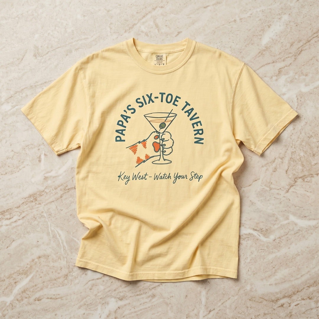 FIVE TIDES APPAREL banana yellow garment-dyed cotton t-shirt with Papa's Six-Toe Tavern martini and lobster graphic.