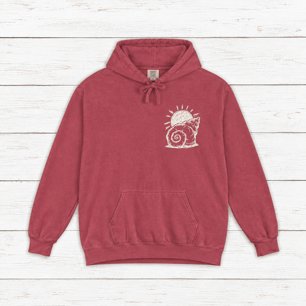 Beach Snail hoodie flat lay on whitewashed boards