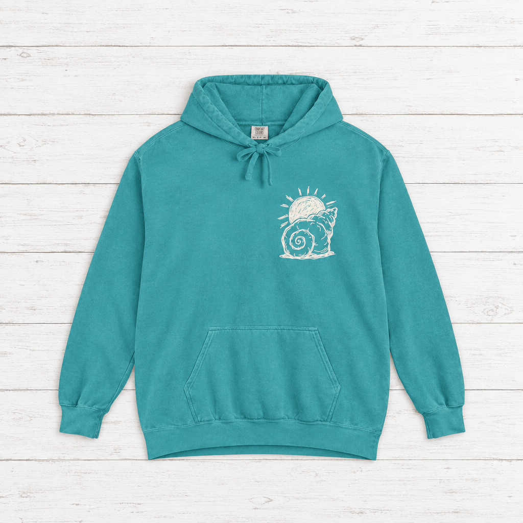 Beach Snail hoodie flat lay on whitewashed boards