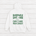 Cape May Dive Bar white hoodie flat lay — line-art graphic pullover by Five Tides Apparel