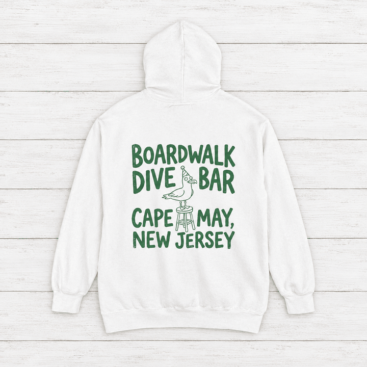 Cape May Dive Bar white hoodie flat lay on whitewashed boards