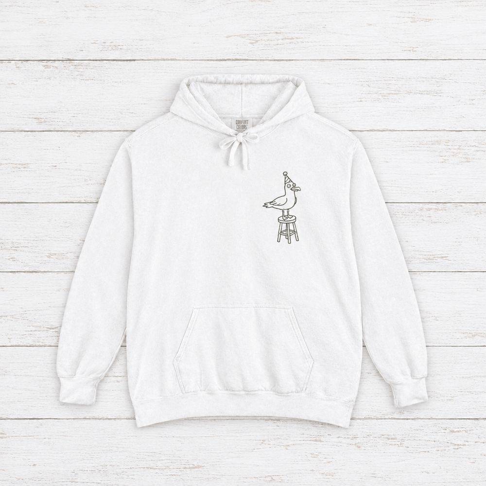 Cape May Dive Bar white hoodie flat lay on whitewashed boards