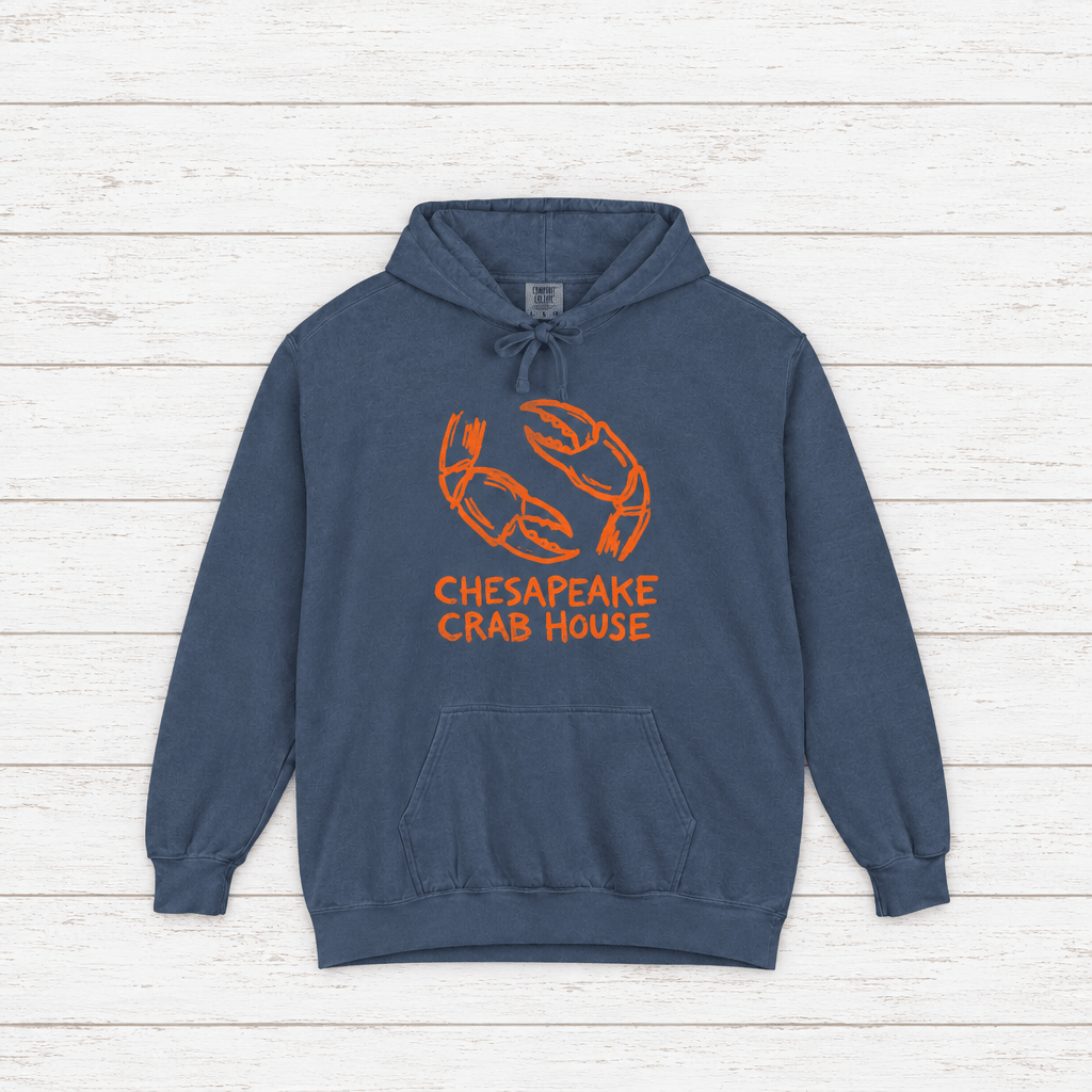 Chesapeake Crab House hoodie flat lay on whitewashed boards