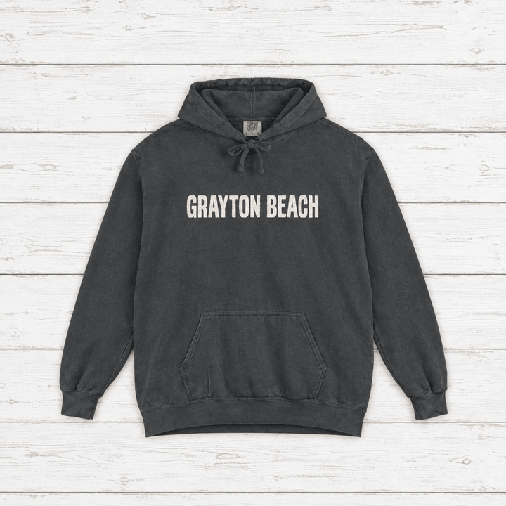Grayton Beach hoodie flat lay on whitewashed boards