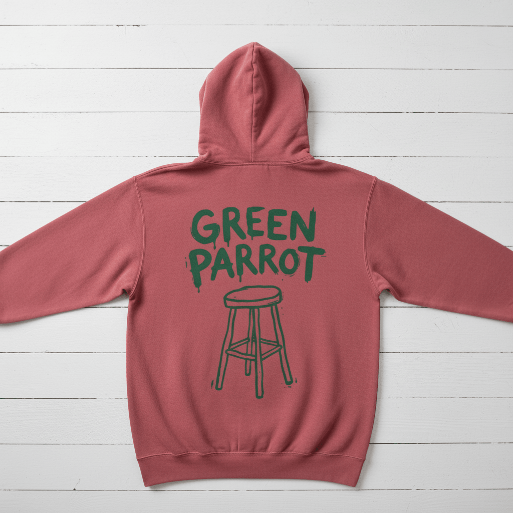 Crimson Green Parrot hoodie back flat lay on whitewashed boards