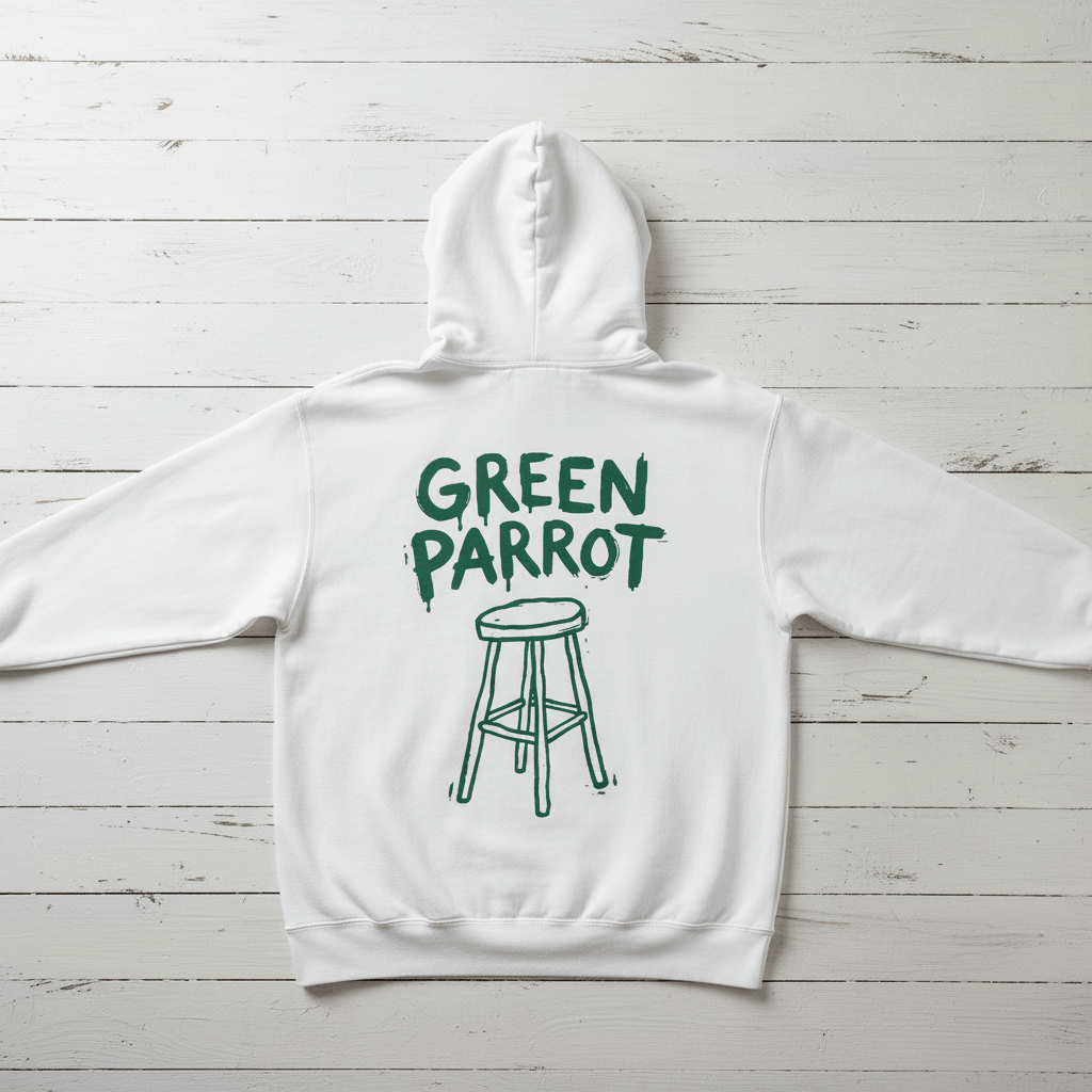 White Green Parrot hoodie back flat lay on whitewashed boards