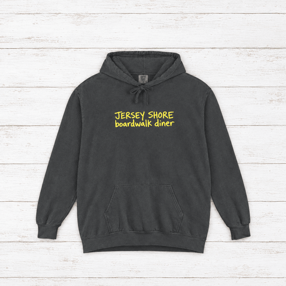 Jersey Shore Boardwalk Diner hoodie flat lay on whitewashed boards