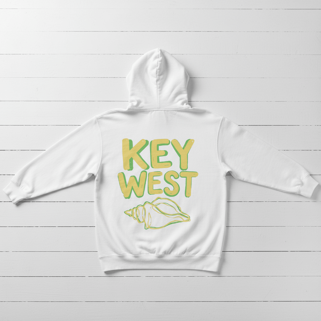 White Key West conch shell hoodie back flat lay on whitewashed boards