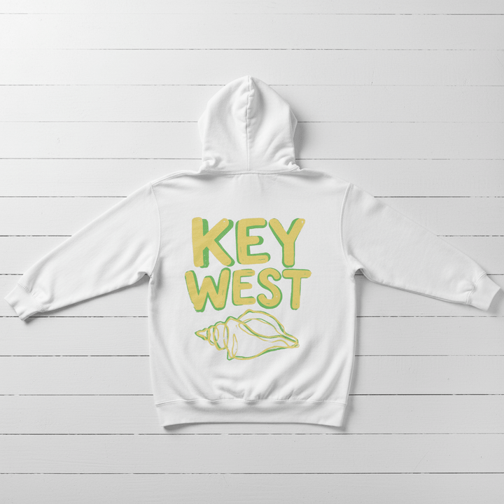 White Key West conch shell hoodie back flat lay on whitewashed boards