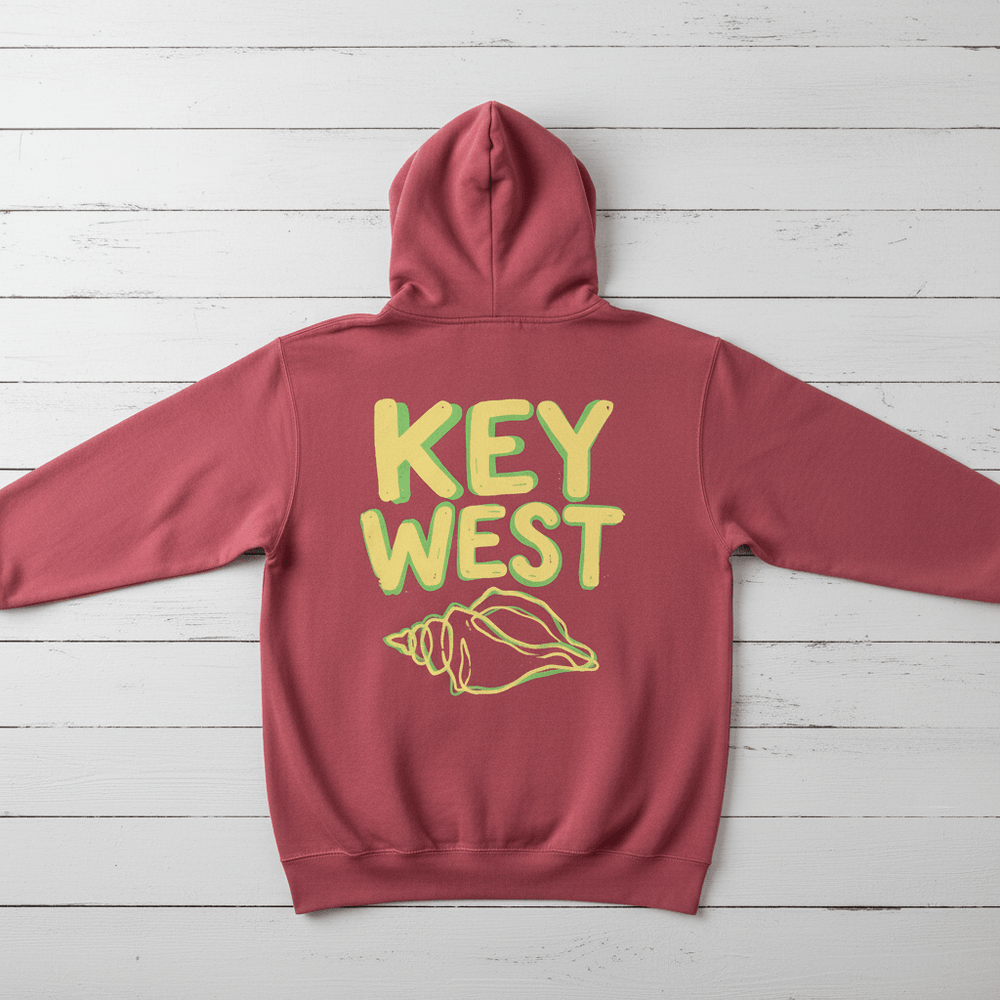 Crimson Key West conch shell hoodie back flat lay on whitewashed boards by Five Tides Apparel