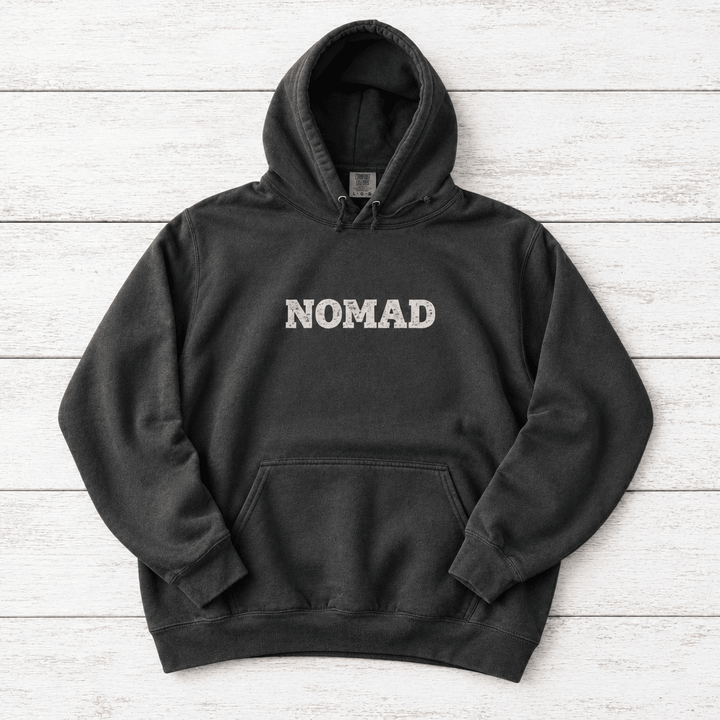 Pepper Nomad hoodie flat lay, front view with chest wordmark — coastal graphic pullover by Five Tides Apparel