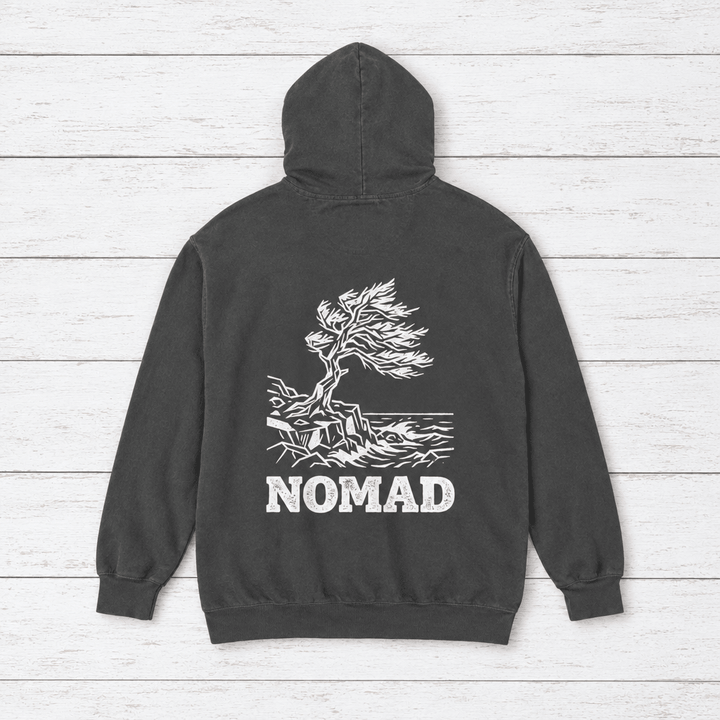 Pepper Nomad hoodie flat lay, back view with windswept tree shoreline print — coastal pullover by Five Tides Apparel