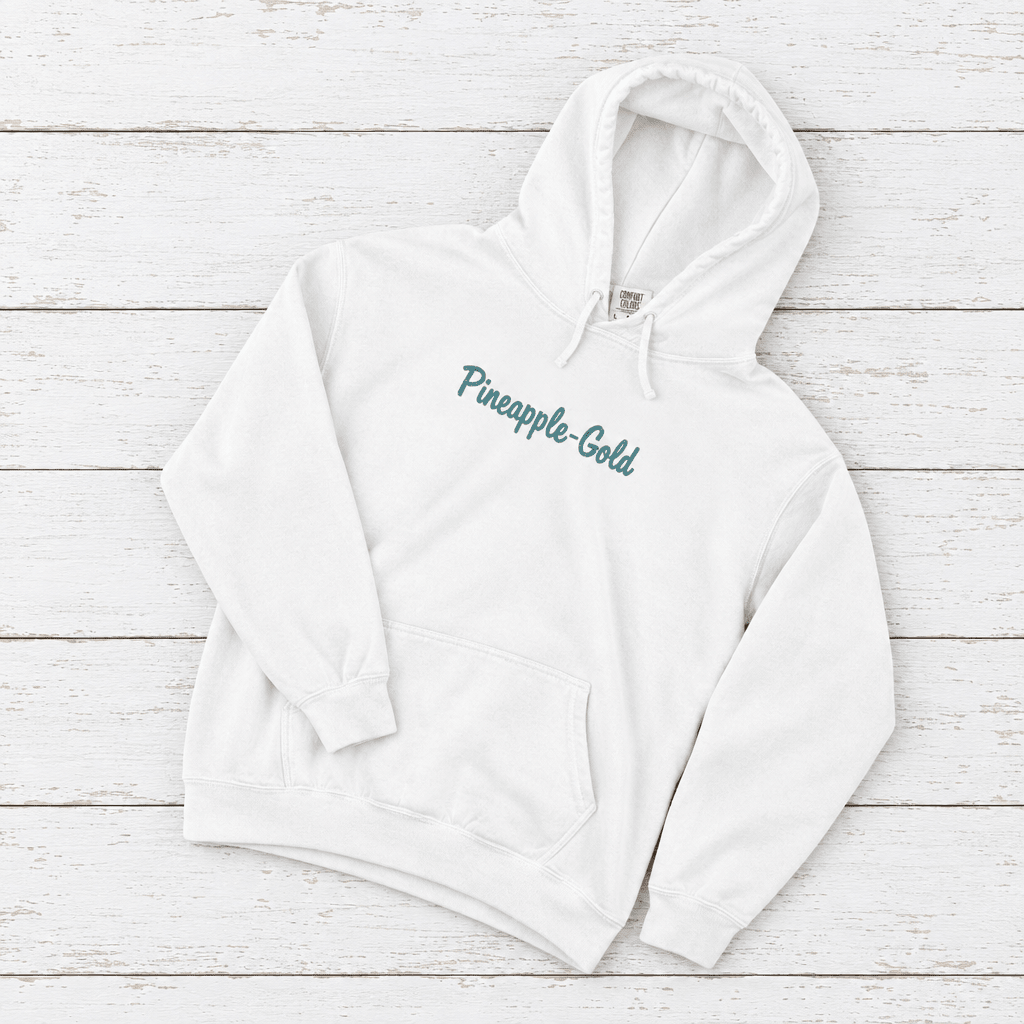 Pineapple-Gold rooster hoodie flat lay on whitewashed boards