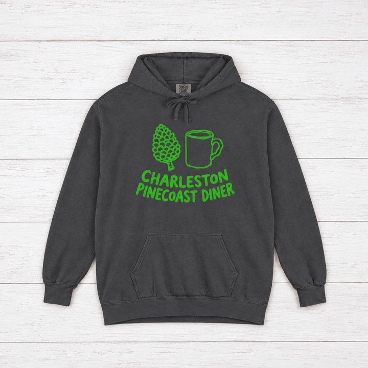 Pinecoast Diner hoodie flat lay on whitewashed boards