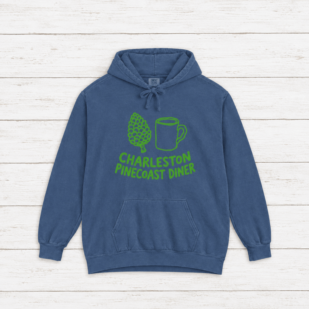 Pinecoast Diner hoodie flat lay on whitewashed boards
