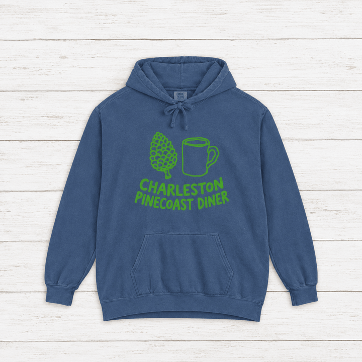 Pinecoast Diner hoodie flat lay on whitewashed boards