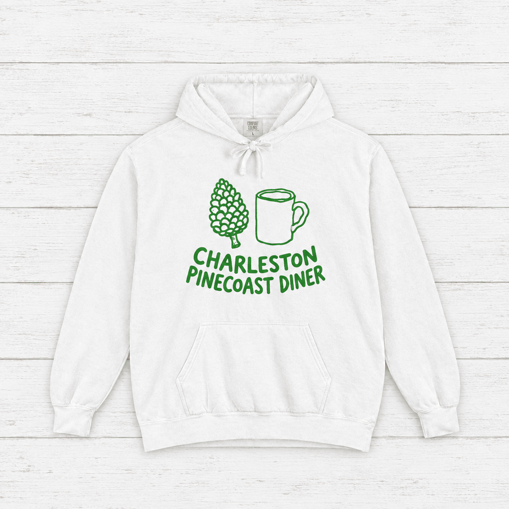 Pinecoast Diner hoodie flat lay on whitewashed boards