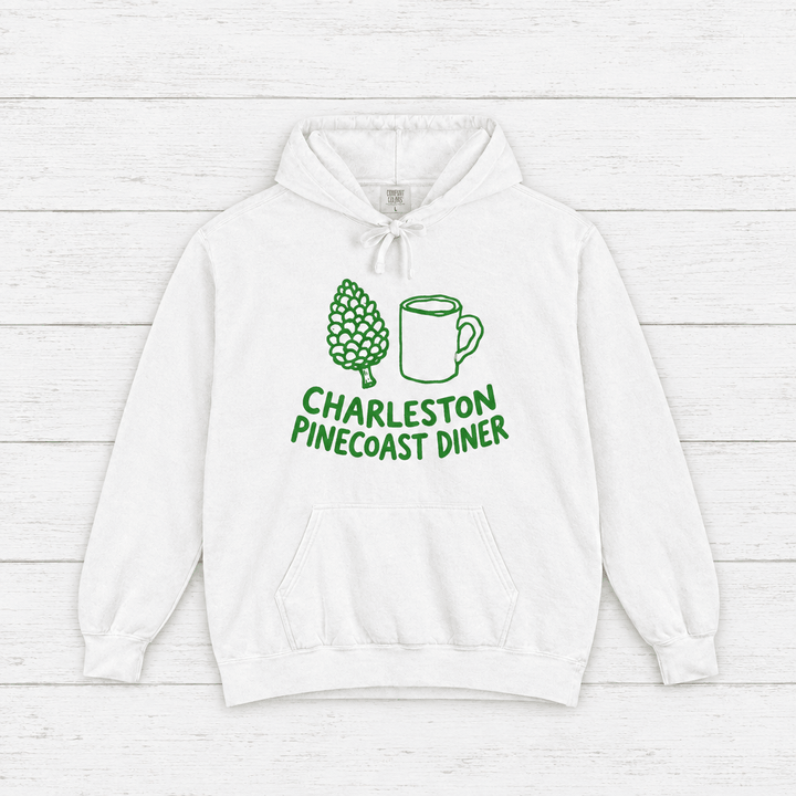 Pinecoast Diner hoodie flat lay on whitewashed boards