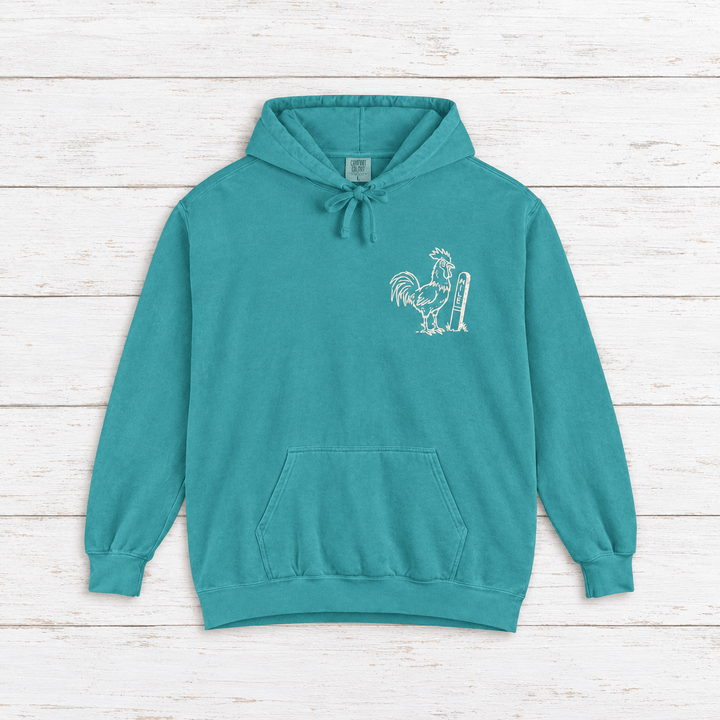 Rooster Surf hoodie flat lay on whitewashed boards