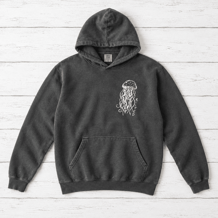 Salt Rooted Jellyfish hoodie flat lay on whitewashed boards