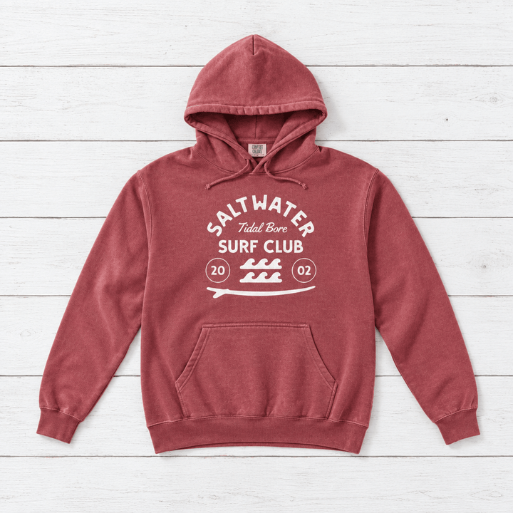 Crimson Saltwater Tidal Bore Surf Club hoodie front on whitewashed boards