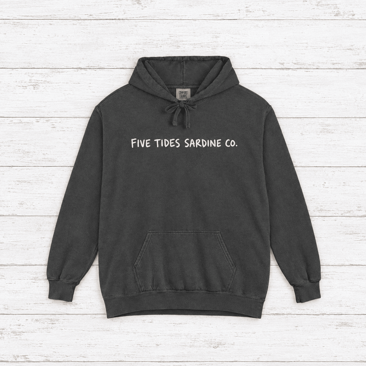 Five Tides Sardine Co. hoodie flat lay on whitewashed boards