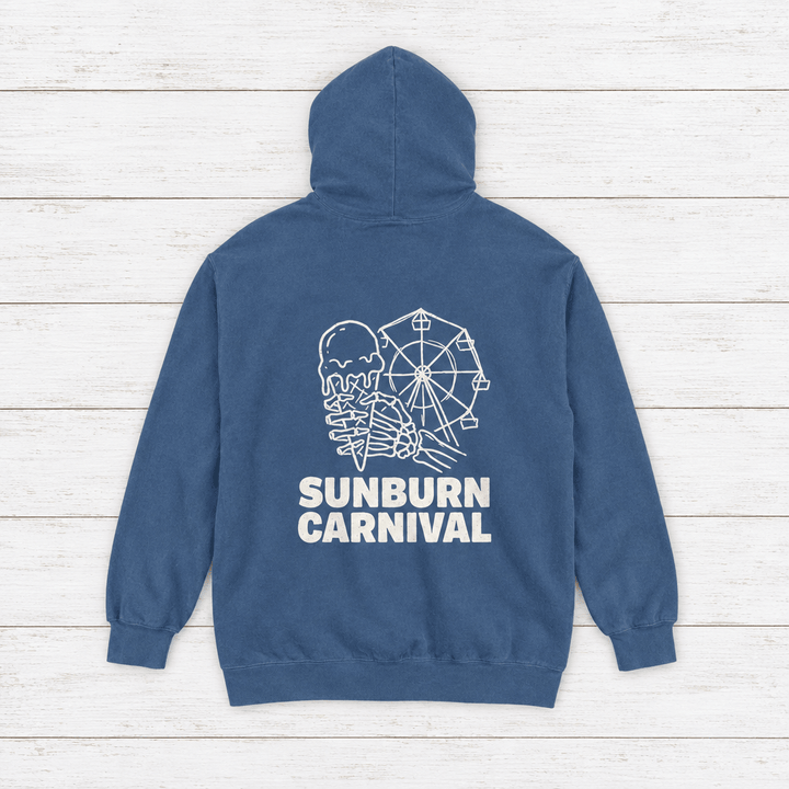 Sunburn Carnival hoodie flat lay on whitewashed boards