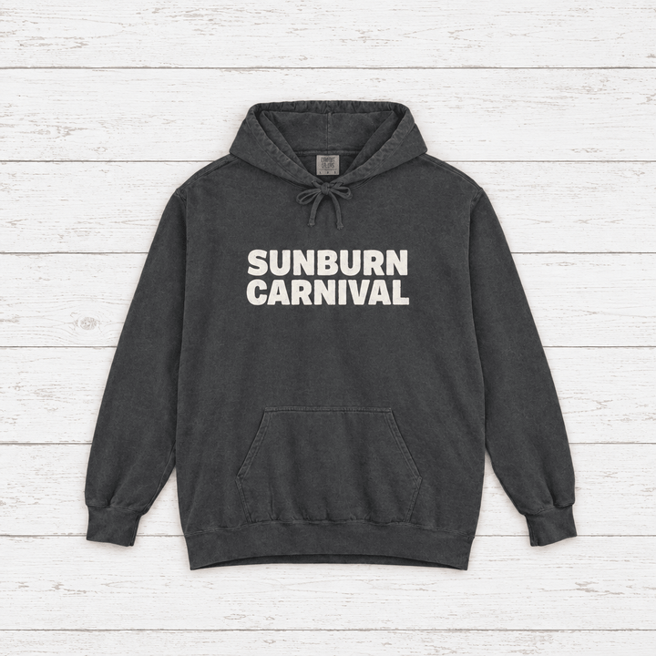 Sunburn Carnival hoodie flat lay on whitewashed boards