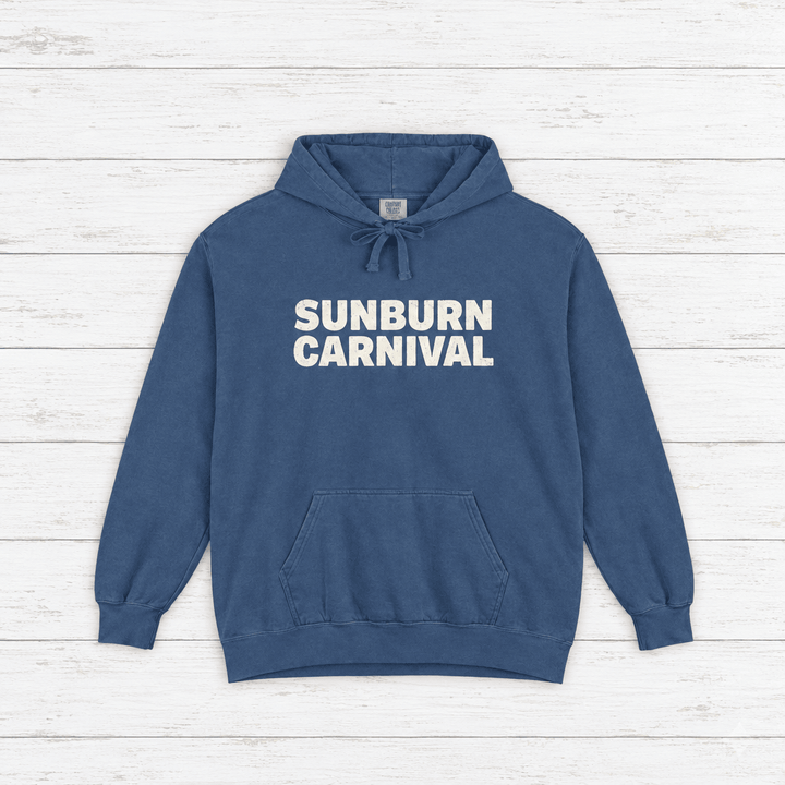 Sunburn Carnival hoodie flat lay on whitewashed boards
