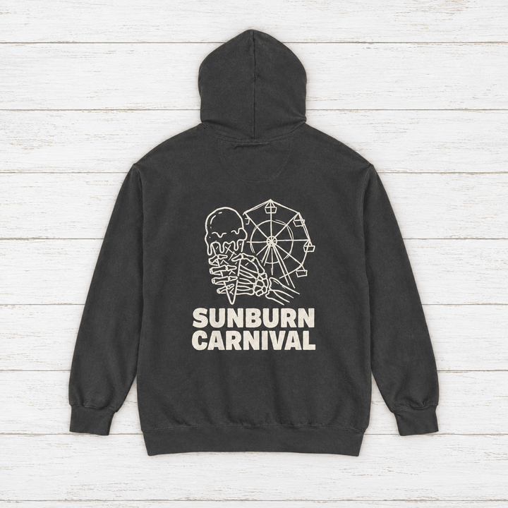 Sunburn Carnival hoodie flat lay on whitewashed boards