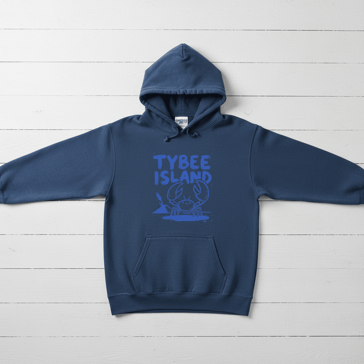 True Navy Tybee Island crab hoodie front flat lay on whitewashed boards