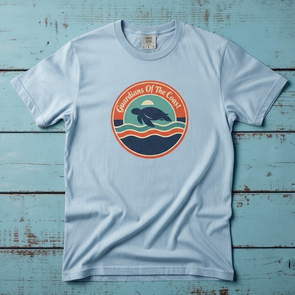 Guardians of the Coast Turtle Retro Badge chambray garment-dyed tee on faded driftwood planks