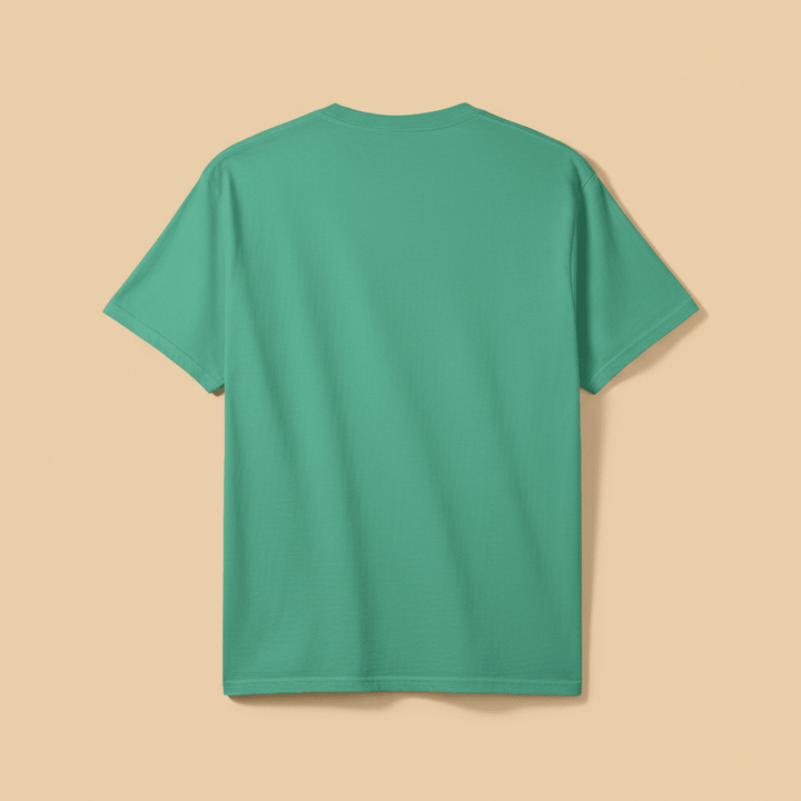 High Tide Happy Mode Tee in Seafoam Green — plain back, warm sand studio background