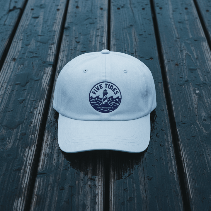 Five Tides Lighthouse Embroidered Dad Cap — Light Blue on Rain-Soaked Driftwood