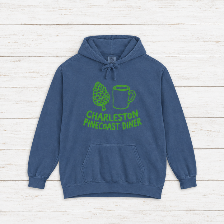 Pinecoast Diner hoodie flat lay on whitewashed boards