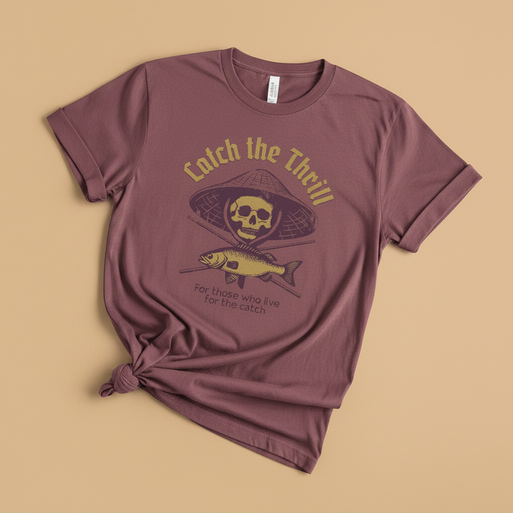 Catch the Thrill Tee in Brick/Mauve — front graphic, warm sand studio background