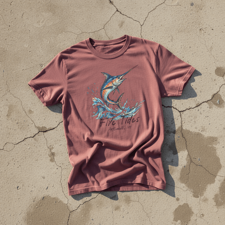 Marlin Surf brick garment-dyed tee on light cracked cement with wet marks