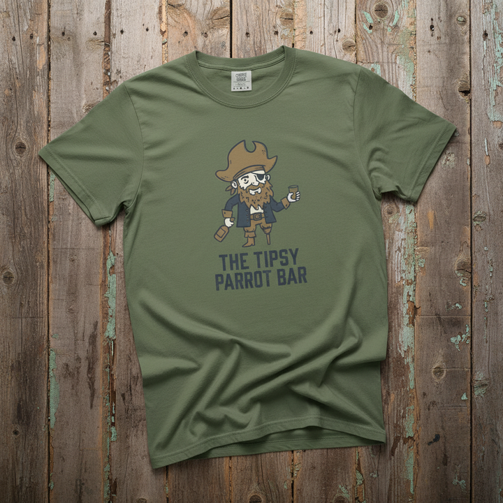 Tipsy Parrot Bar sage garment-dyed tee casually tousled on rustic reclaimed wood