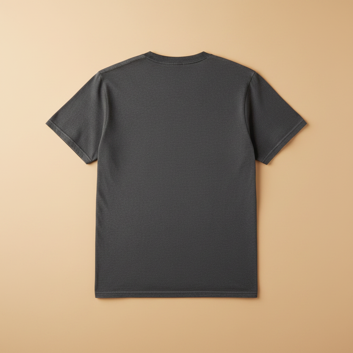 Catalina Fish Market Tee in Pepper/Charcoal — plain back, warm sand studio background