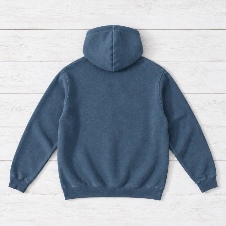 Denim hoodie back flat lay on whitewashed boards