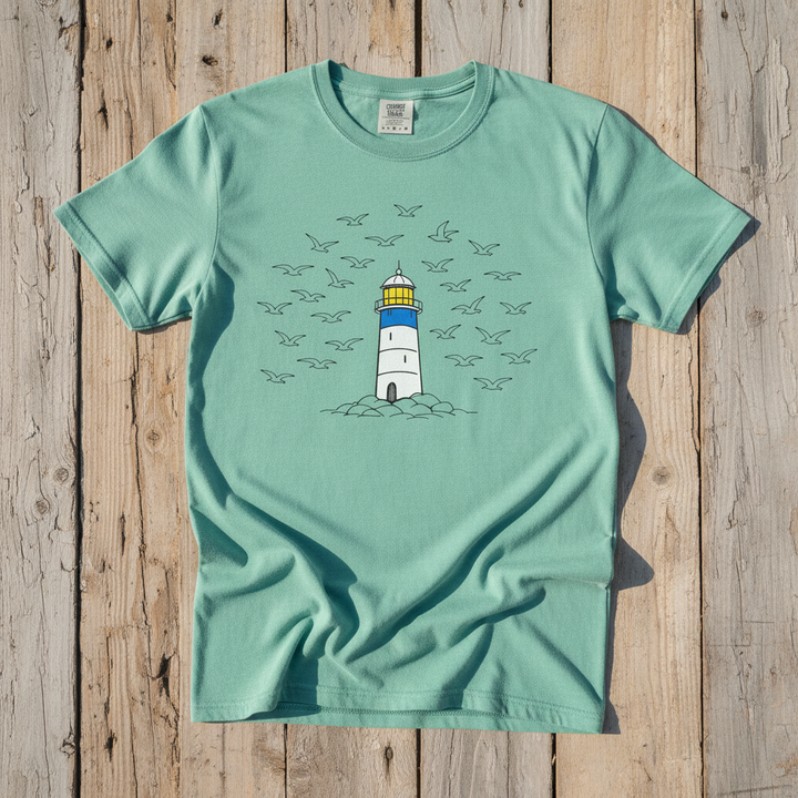 Lighthouse Coastal island reef garment-dyed tee on faded driftwood planks