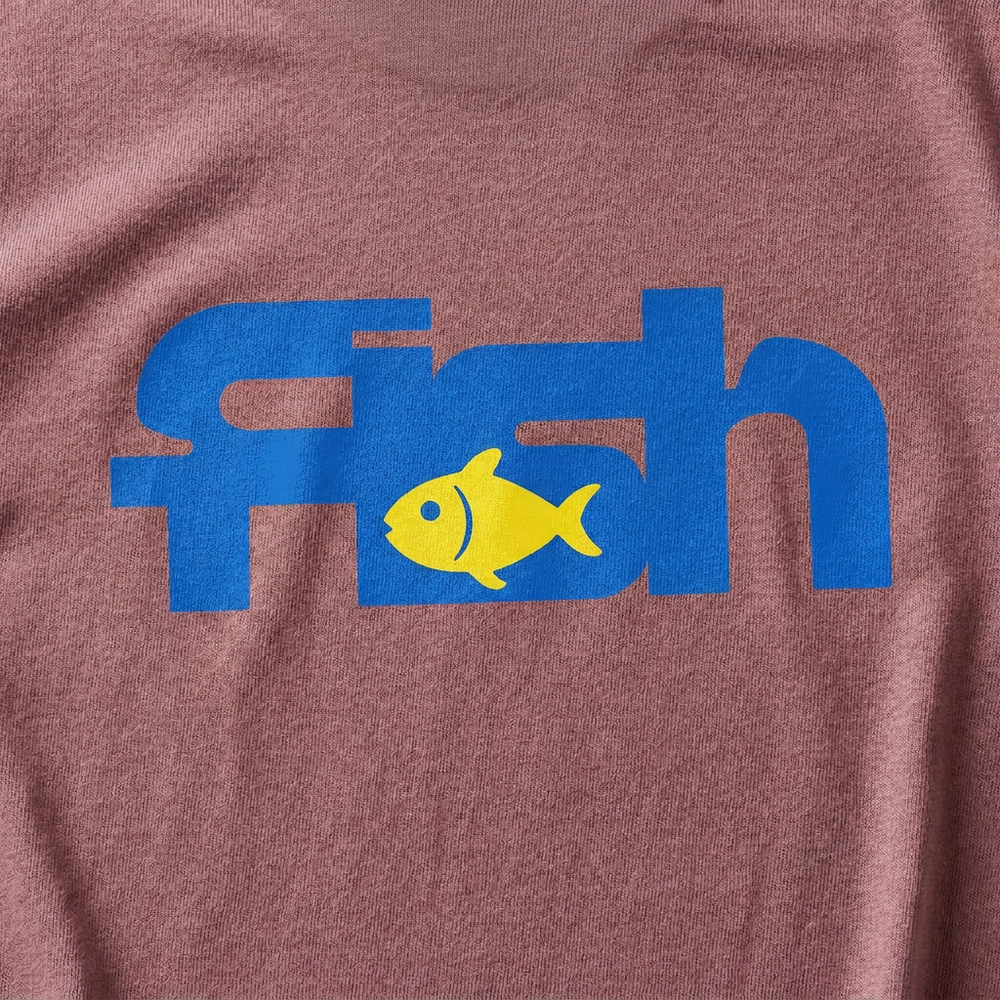 Fish East Coast tee blue wordmark and yellow fish graphic close-up on Brick cotton