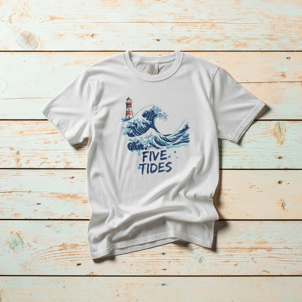 Wave & Lighthouse white garment-dyed tee casually tousled on rustic reclaimed wood
