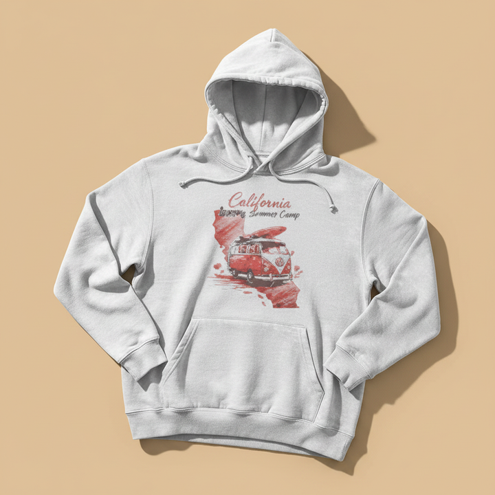California Summer Camp Hoodie in White — front graphic corrected, warm sand studio background