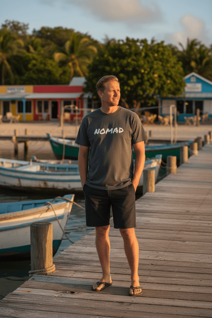 Male lifestyle - charcoal NOMAD tee, tropical island dock