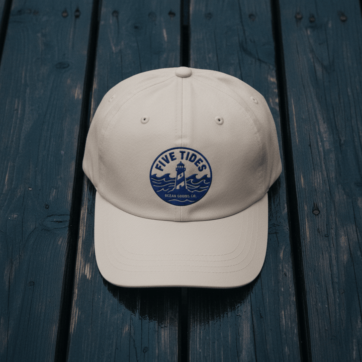 Five Tides Lighthouse Embroidered Dad Cap — Stone on Rain-Soaked Driftwood