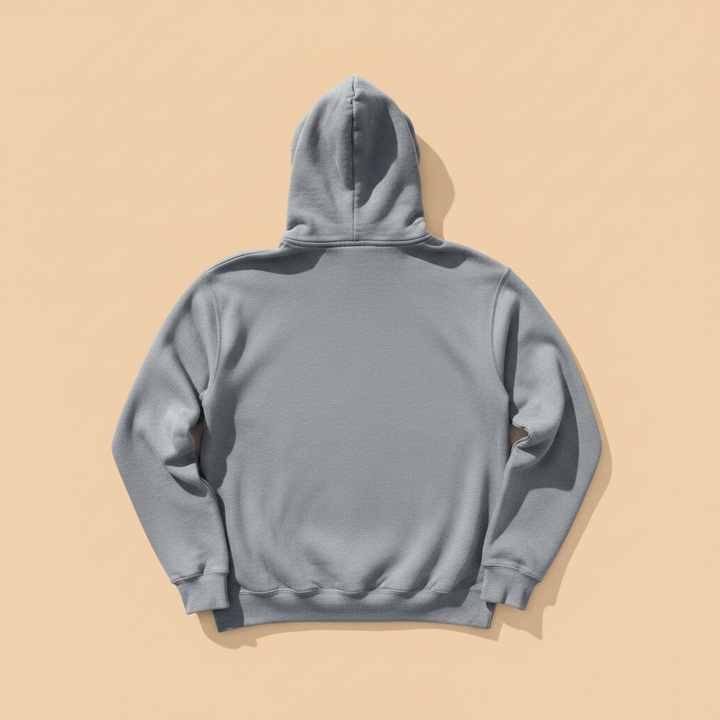 Coastal Vibes Hoodie in Grey — plain back, warm sand studio background