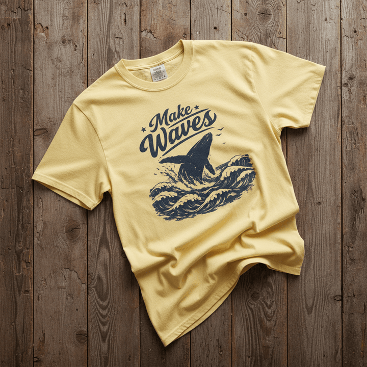 Make Waves banana garment-dyed whale tee casually tousled on rustic reclaimed wood