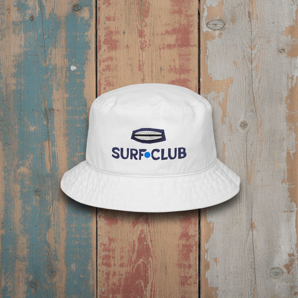 Surf Club Embroidered Bucket Hat white on faded driftwood planks