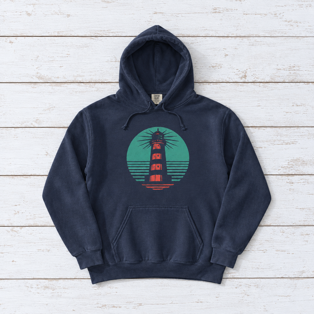 Coastal Lighthouse hoodie flat lay on whitewashed boards